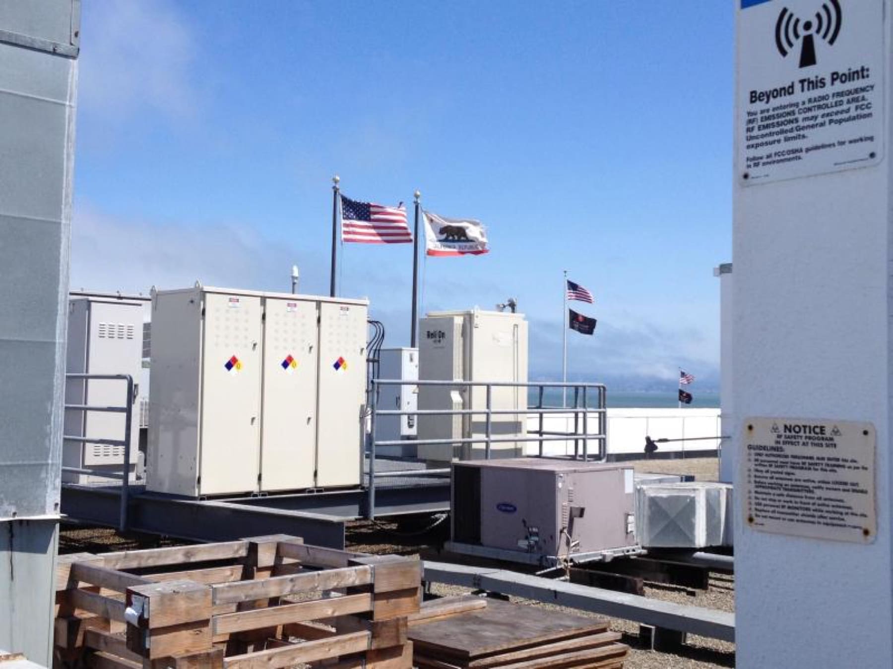 Light grey outdoor cabinets installed on a rooftop