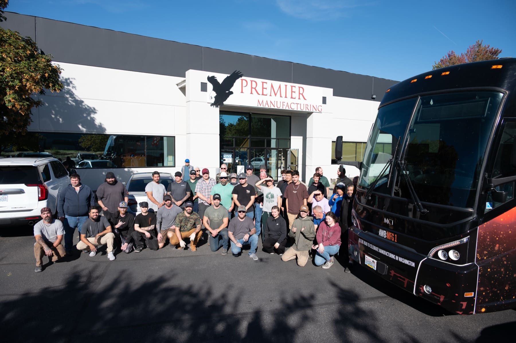 The Premier crew outside the Liberty Lake plant during the 2025 Manufacturing Week bus tour